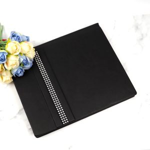 آلبوم عکس طرح چرمی نواردار مشکی 25*20 سانتی متر_6933654f26ae1.jpeg آلبوم عکس طرح چرمی نواردار مشکی 25*20 سانتی متر