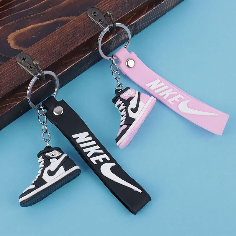 جاکلیدی سیلیکونی طرح کفش Nike + بند آویز_6942ab4c208cf.jpeg