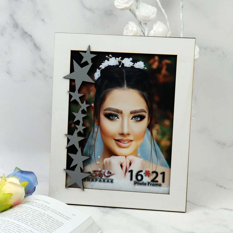 قاب عکس شاپرک طرح ستاره نقره ای 21*16 سانتی متر