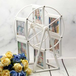 قاب عکس طرح چرخ و فلک سفید 9*12 سانتی متر_69335e7336eff.jpeg قاب عکس طرح چرخ و فلک سفید 9*12 سانتی متر