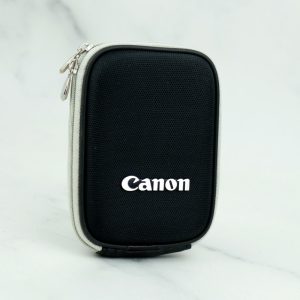 کیف برزنتی Canon مشکی دور طوسی_693315f1bba23.jpeg کیف برزنتی Canon مشکی دور طوسی